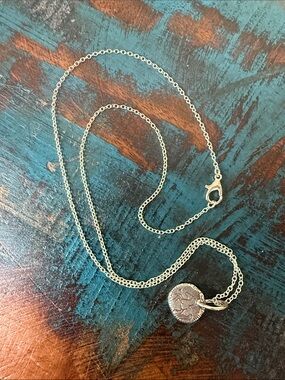 Jes MaHarry unisex “Be Brave” silver horse charm necklace.